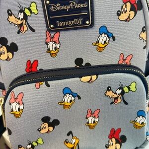 Loungefly Disney Mini Backpack — Blue Disney Character Print